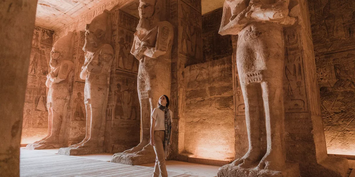 Woman Walking Inside Abu Simbel Temples in Egypt, North Africa