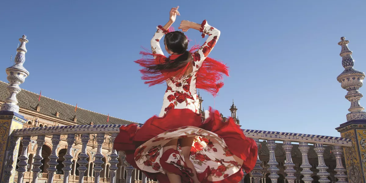 Lady dancing on terrace in Seville