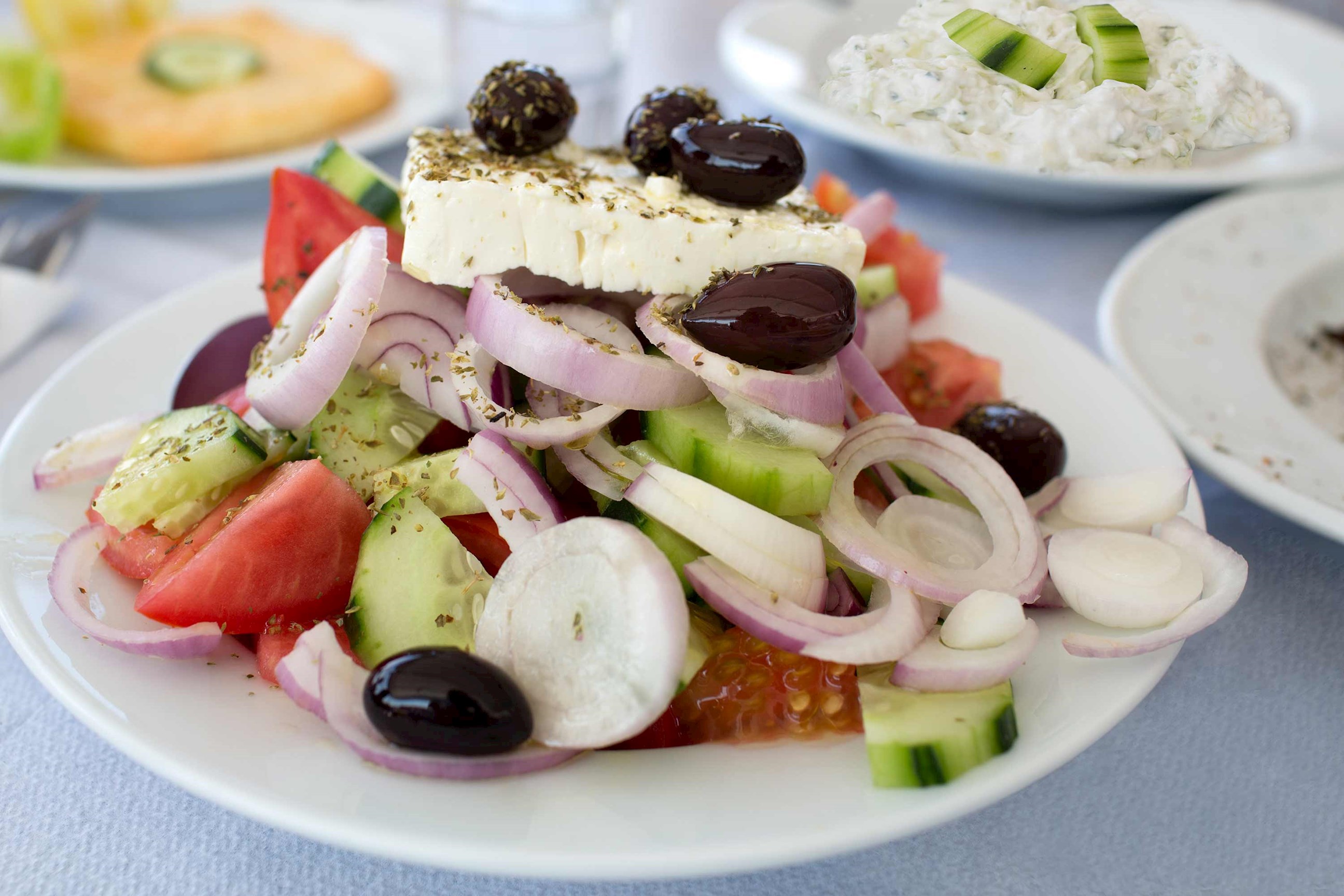Greek salad with feta cheese, olives, cucumber, red onion and tomato