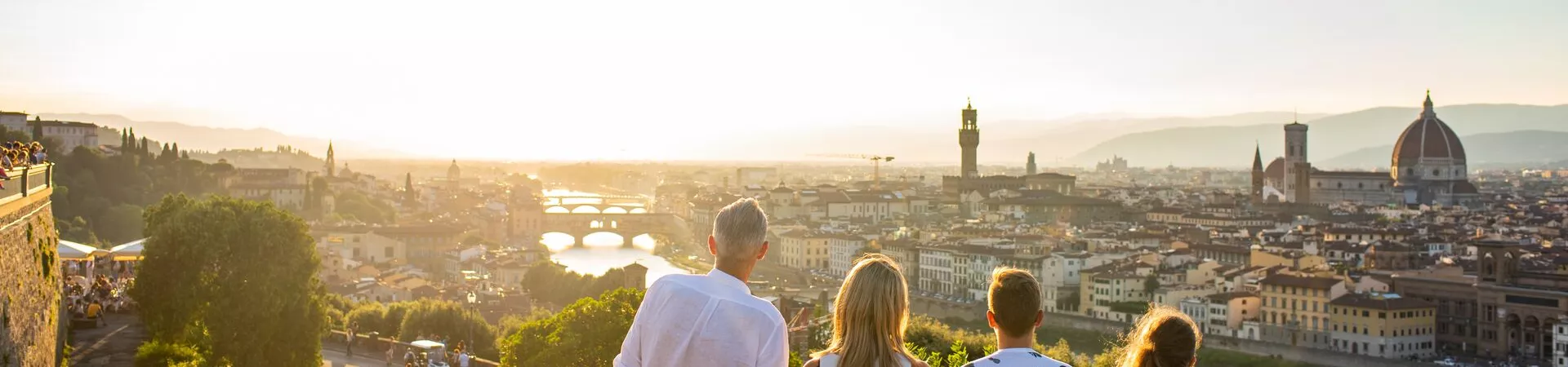 A family looking out at the skyline of Florence, Italy