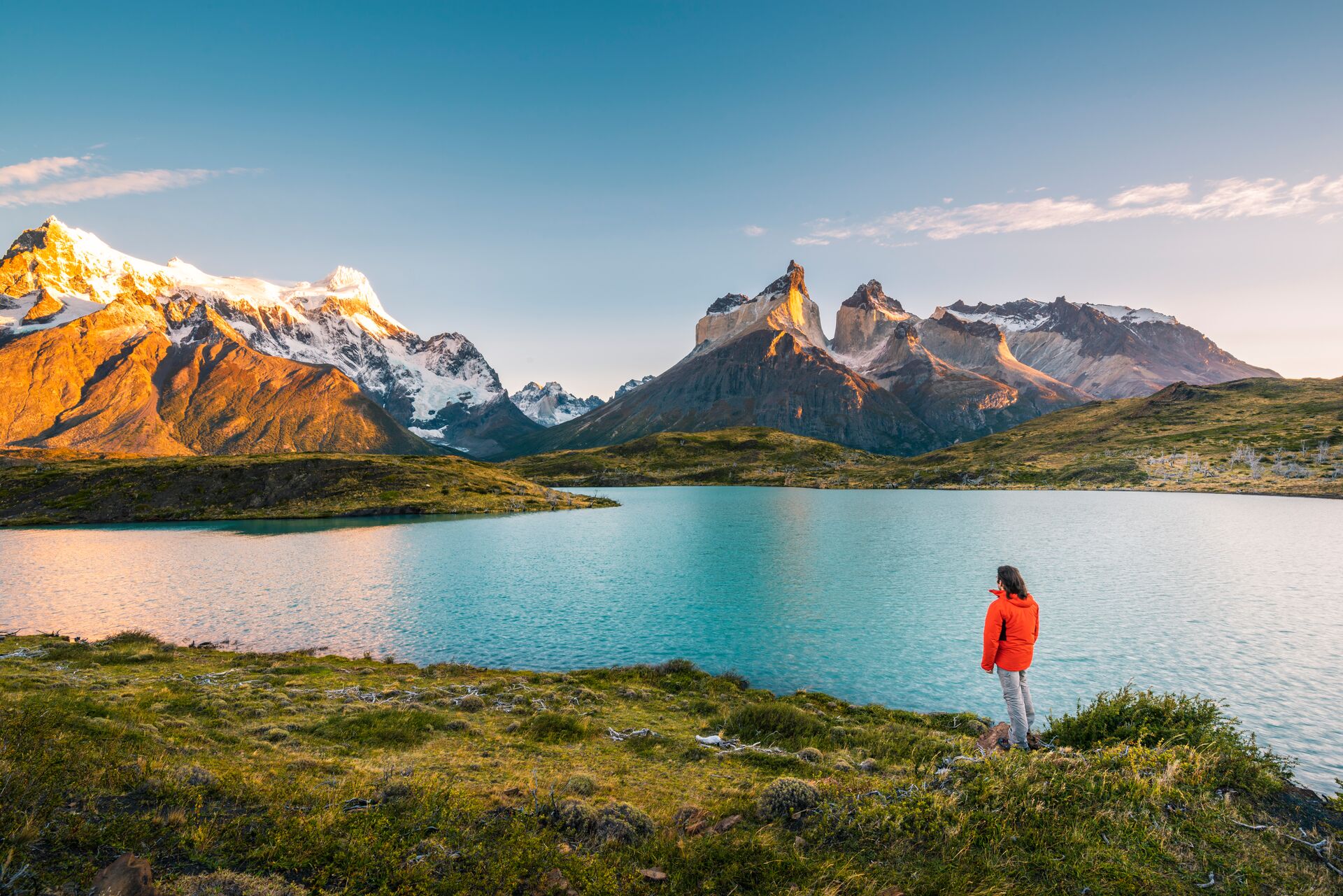 Tourist Admiring The Cordillera Paine In Torres Del Paine National Park