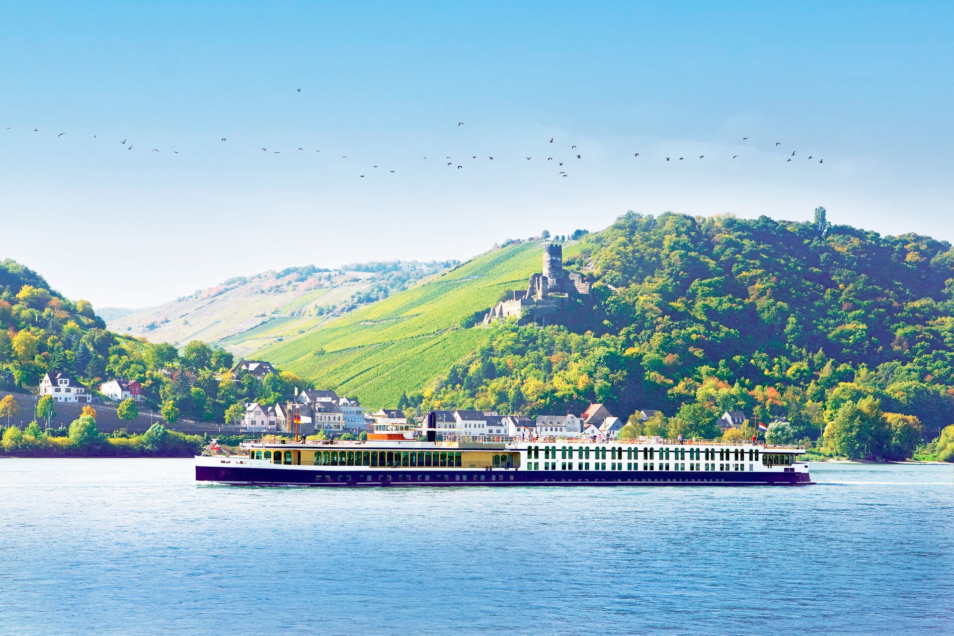 Trafalgar Cruise Ship on the River Rhine with green hills in background