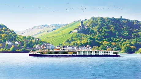 Trafalgar Cruise Ship on the River Rhine with green hills in background