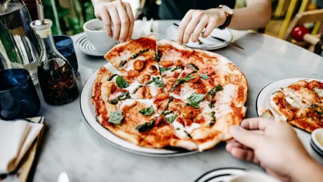 Couple sharing a pizza