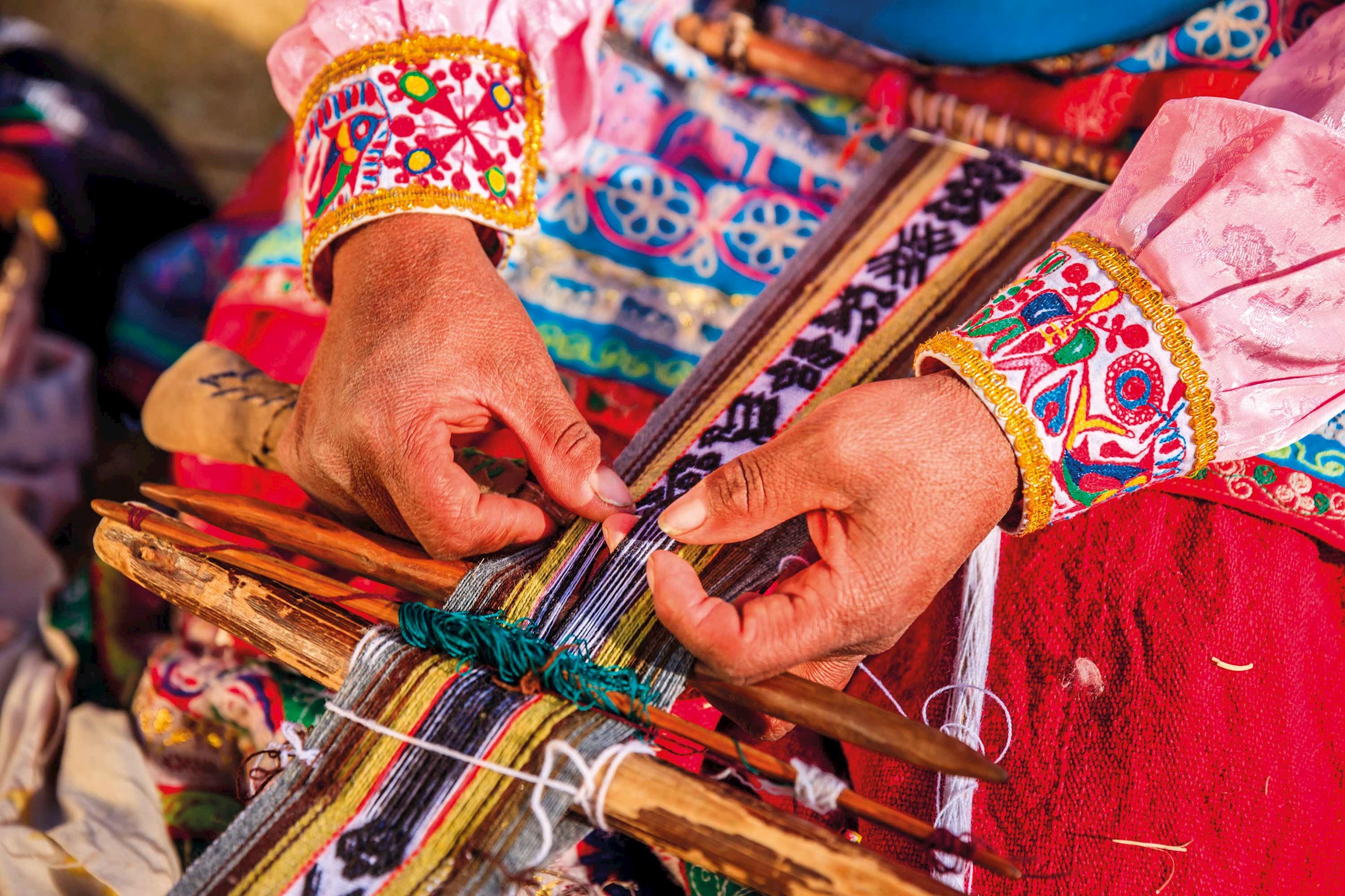 woman-weaving-sacred-valley-peru.jpg