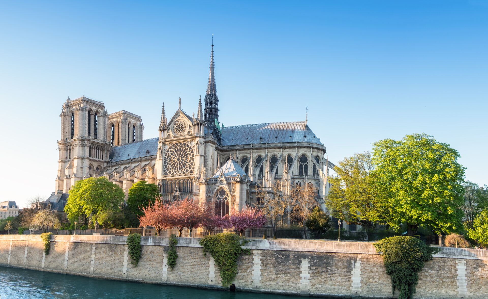 Notre Dame Cathedral in Paris, France on a bright afternoon in Spring