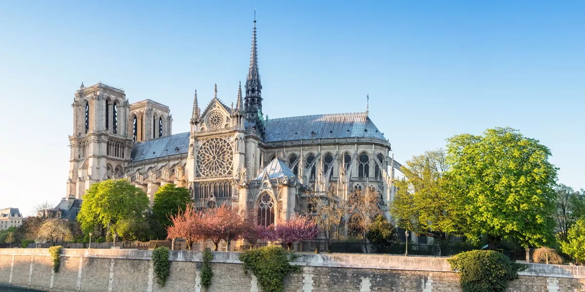 Notre Dame Cathedral in Paris, France on a bright afternoon in Spring