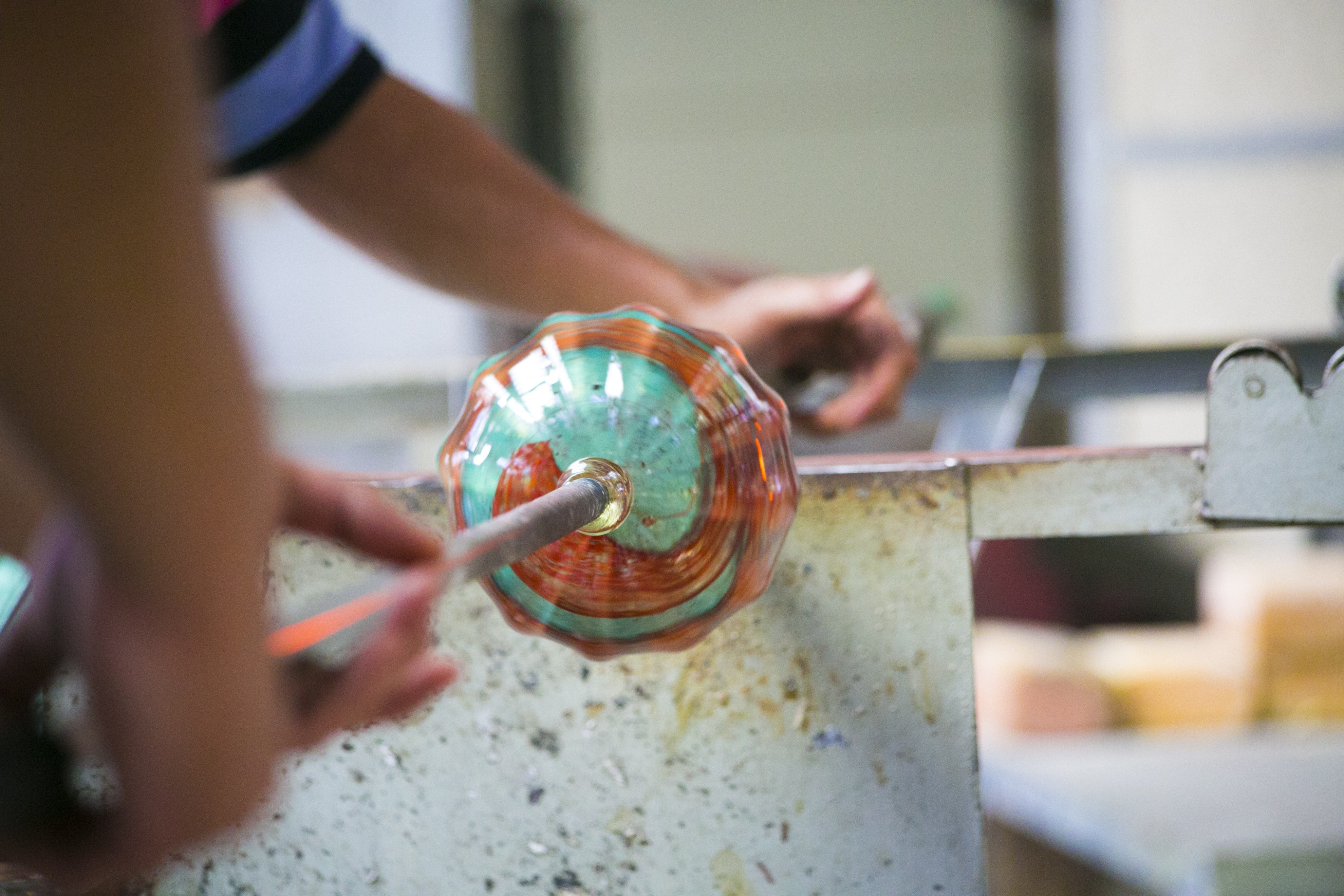 Glass being handcrafted in the glassblowing process
