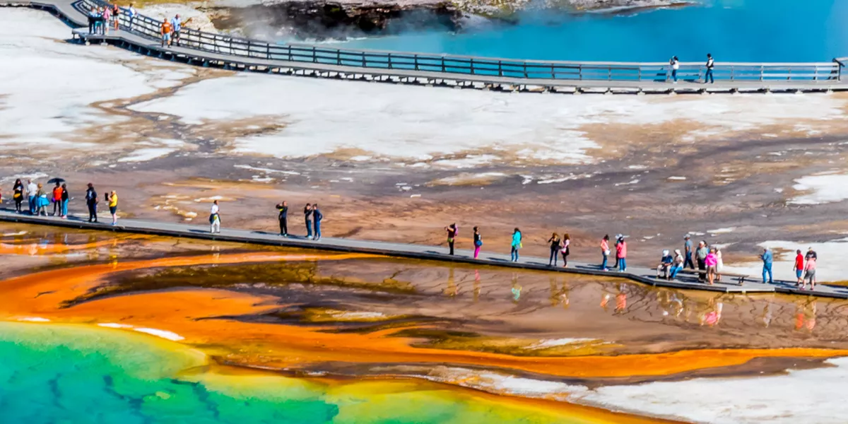 People admiring the Yellowstone Caldera, USA