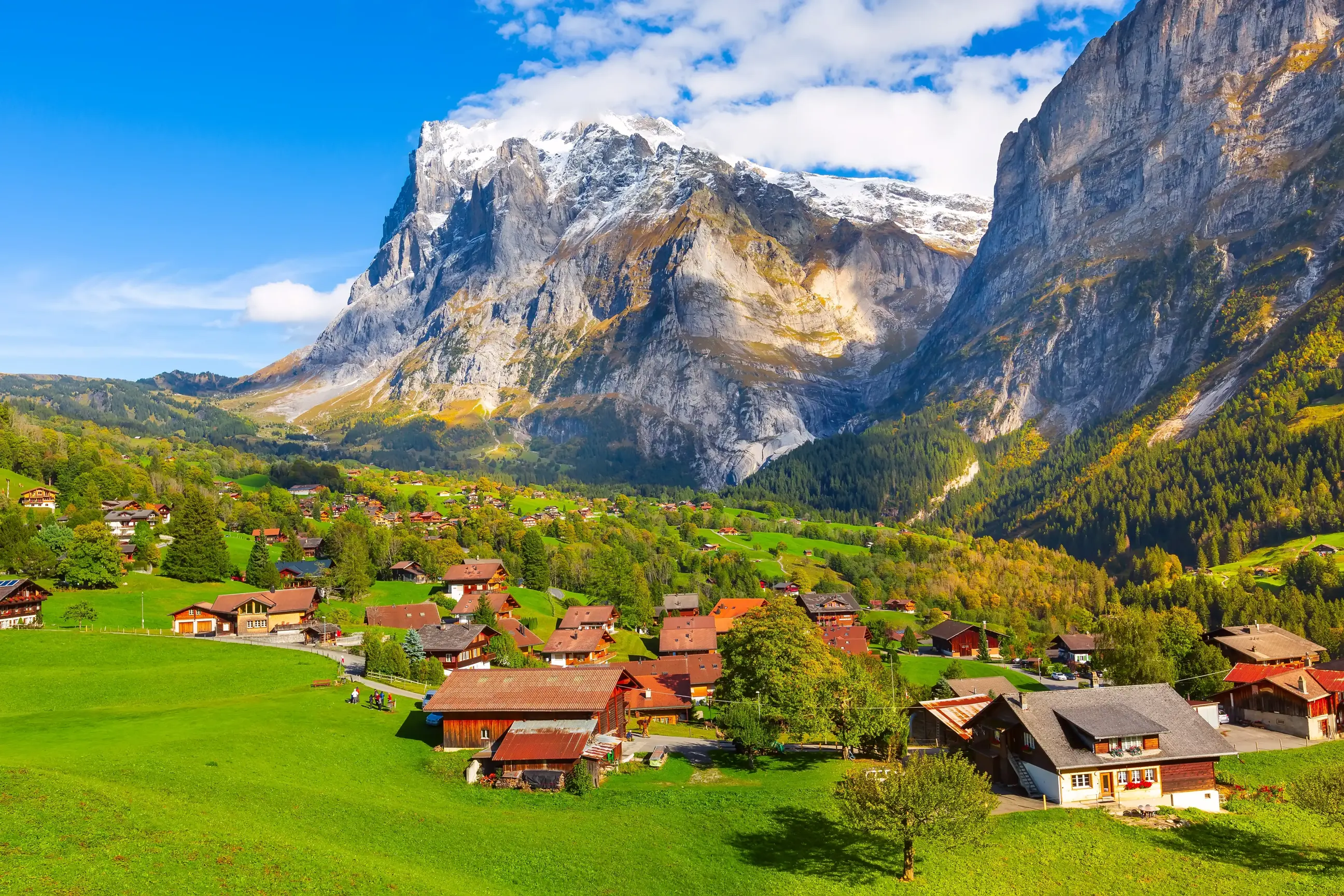 day-hero-grindelwald-village-and-mountains-view-switzerland-1182403075.webp