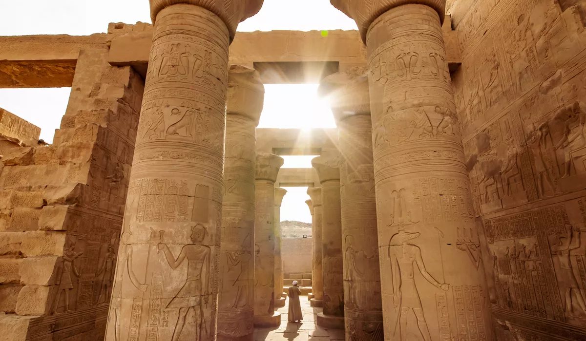 The sun shining brightly through the doorways of the Luxor temple