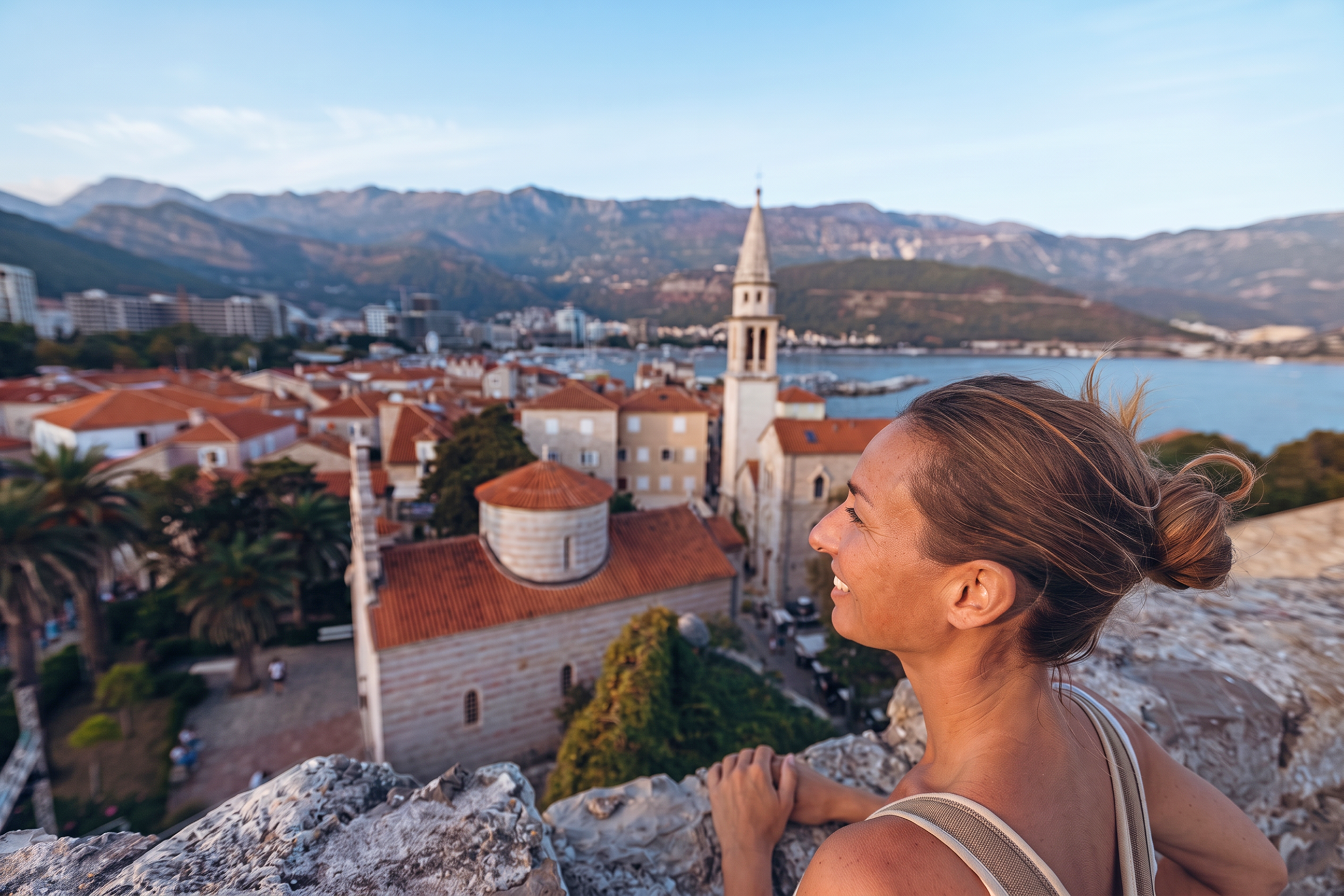day-hero-historic-coastal-town-with-red-rooftops-budva-montenegro-2280753220.webp
