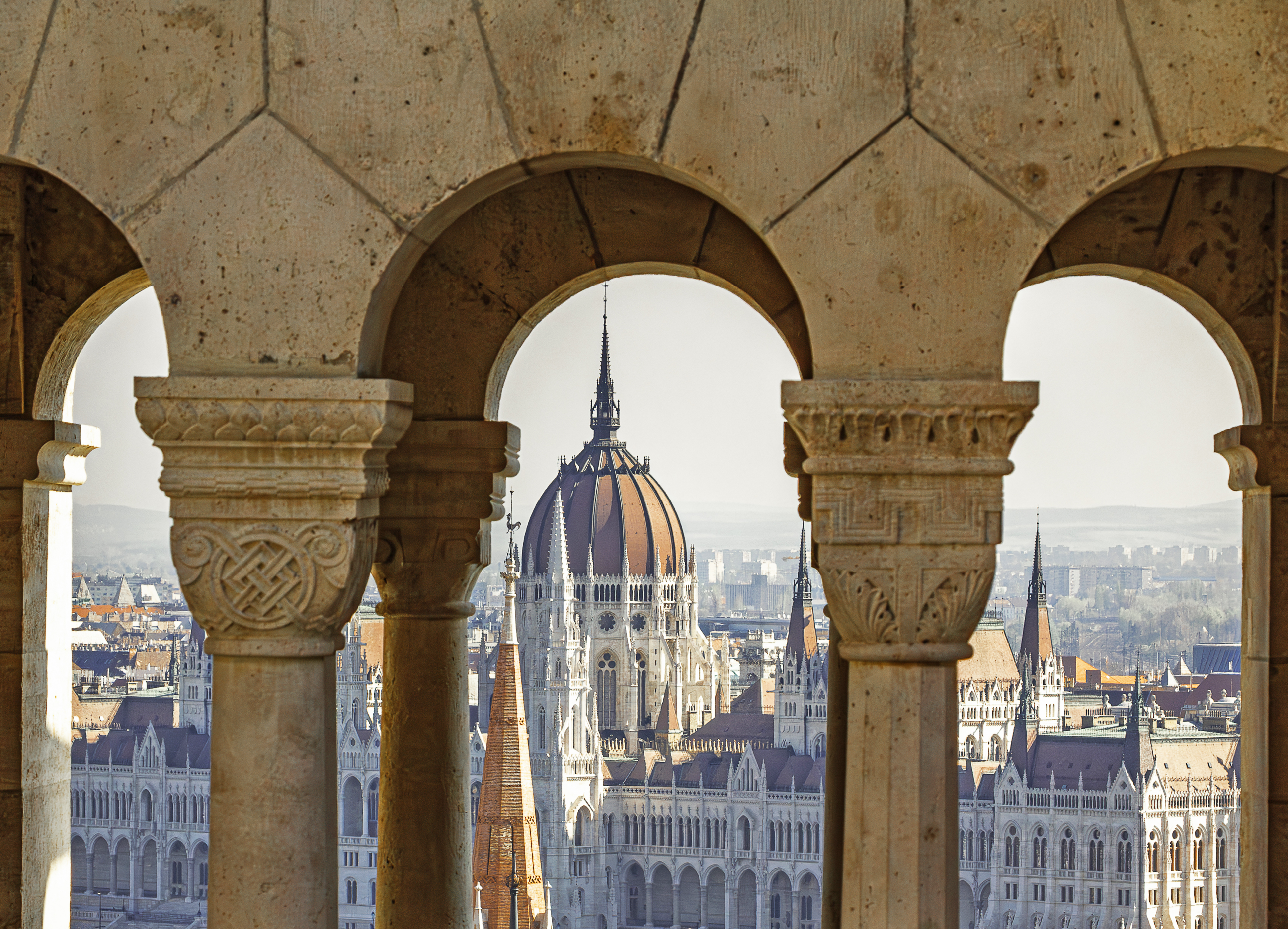 day-hero-framed-perfectly-by-the-arches-budapest-hungary-2217993184.webp