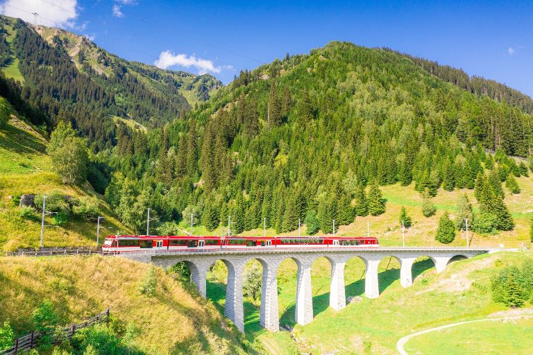 Glacier Express Train On Tujetsch Viaduct Switzerland