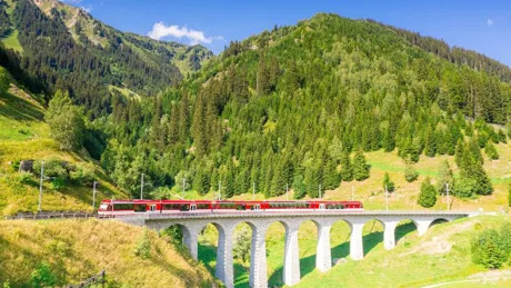 Glacier Express Train On Tujetsch Viaduct Switzerland