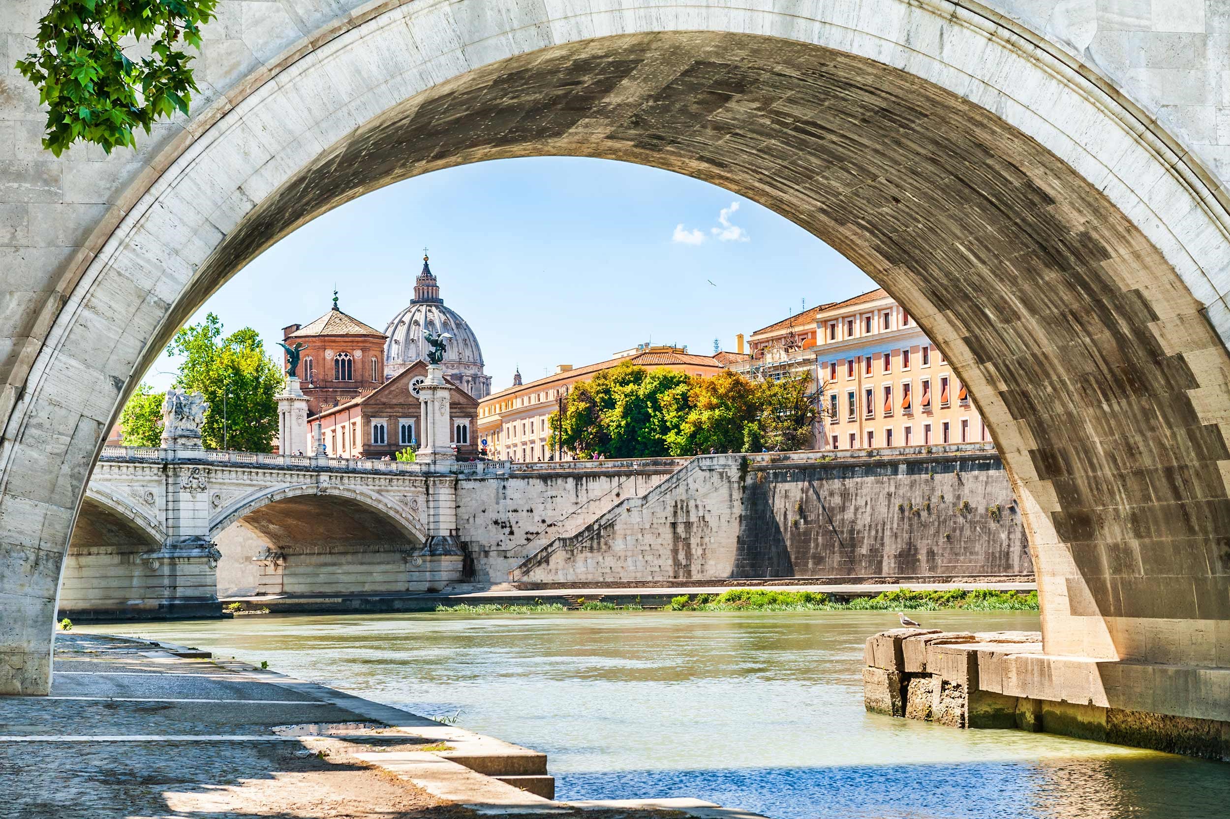Tiber River and St Peters Cathedral in Rome, Italy