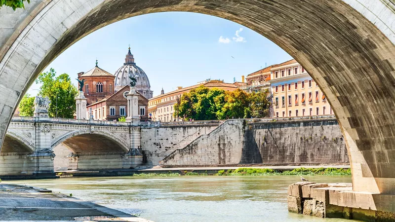 Tiber River and St Peters Cathedral in Rome, Italy
