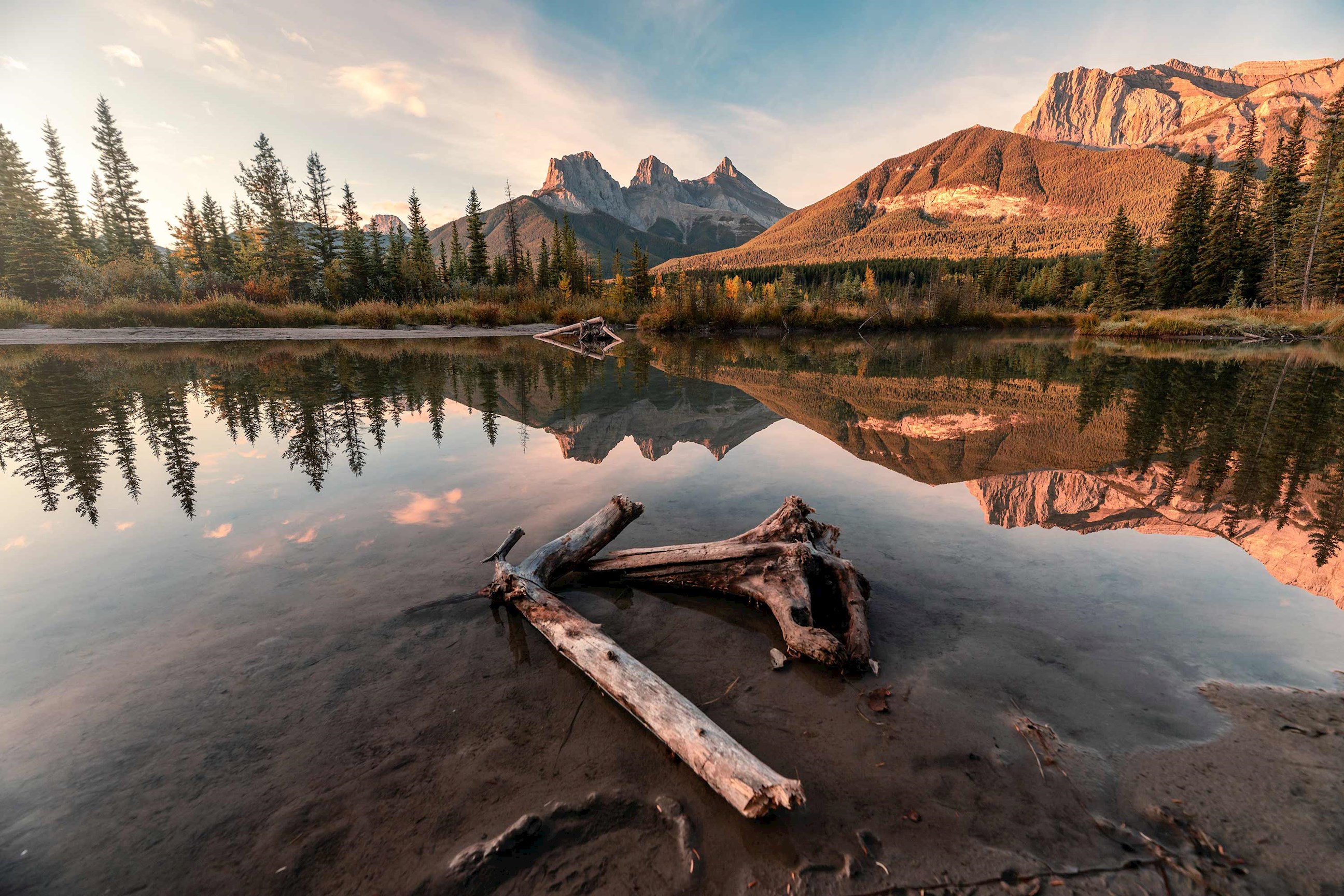 get-up-close-and-personal-with-the-famous-three-sisters-peaks-on-this-scenic-flight-tour-canada.jpg