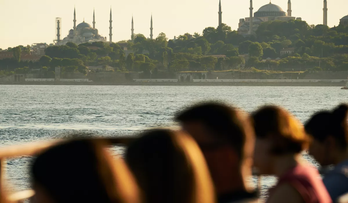 A group of people looking out into the ocean in Istanbul, Turkey