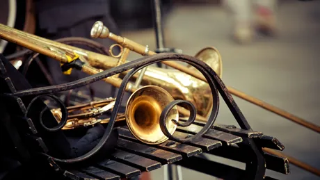 Trombone lying on wooden bench in New Orleans, USA