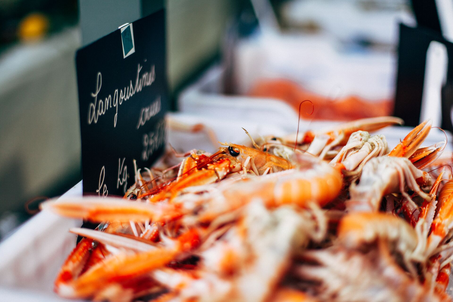 Pile of cooked Langoustine in a market