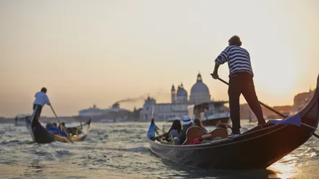 People on a gondola ride in Italy