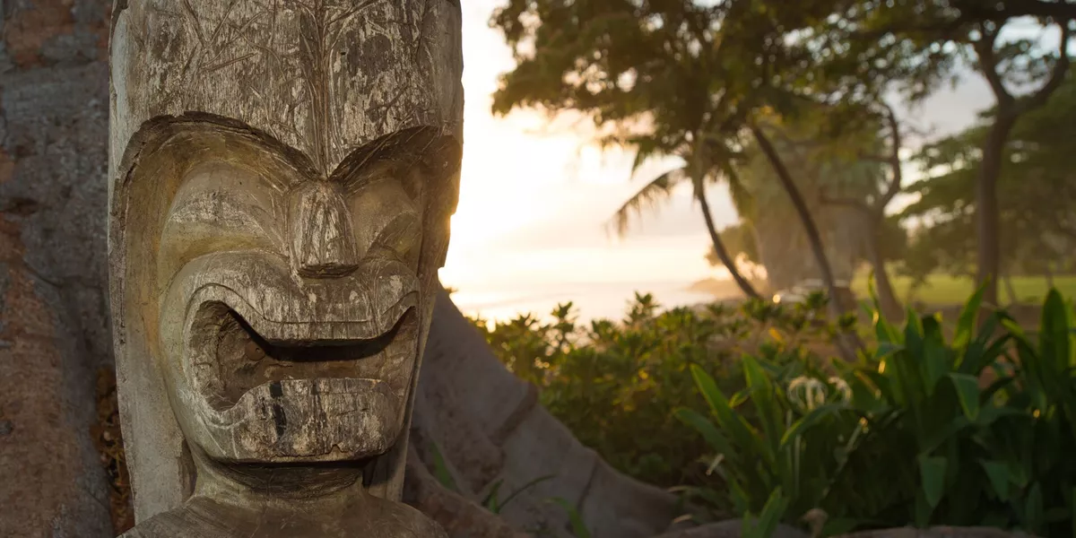 Sun setting over Maui Tiki on Hawaii in USA