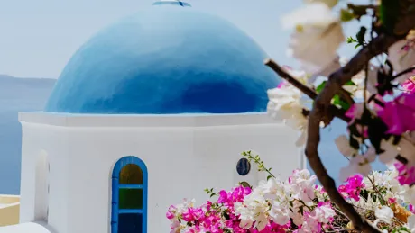 Blue domed church in Santorini, Greece