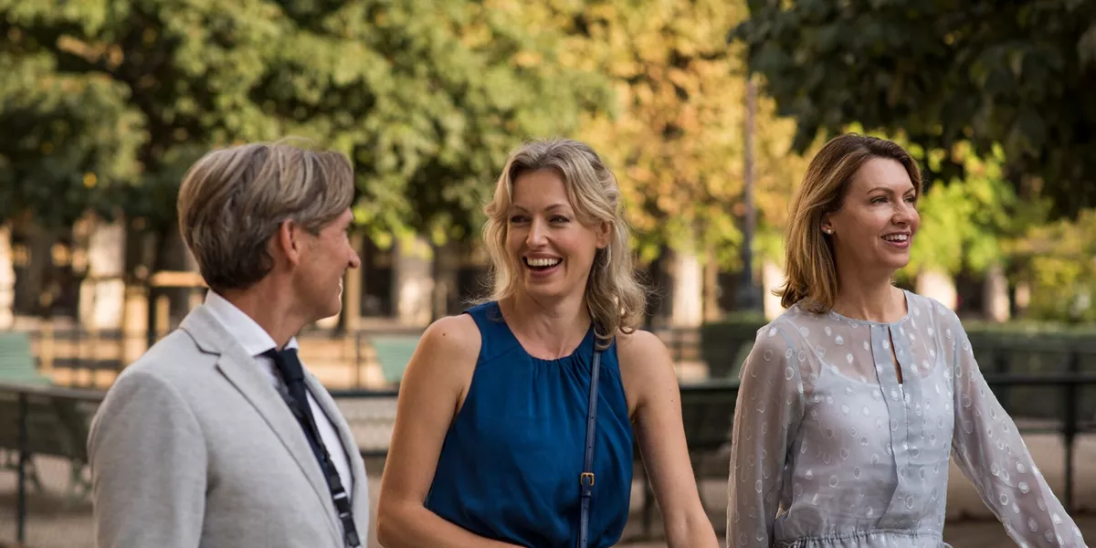 Travel Director with guests in Paris, France