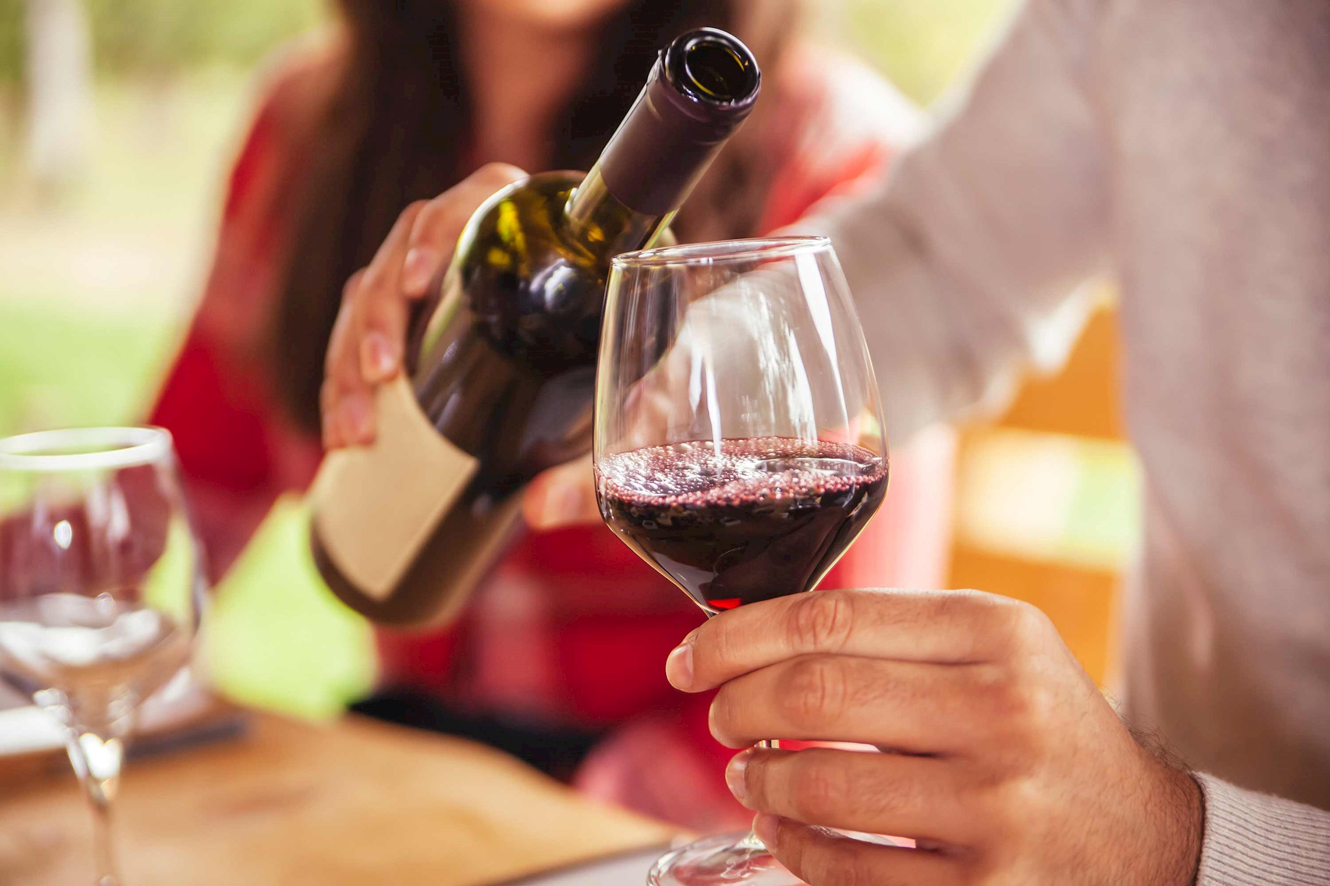 Bottle and glass of wine in Bibich Family winery in Skradin, Croatia 