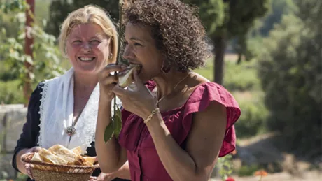 Woman eating bread on a sunny day, Croatia, Dubrovnik