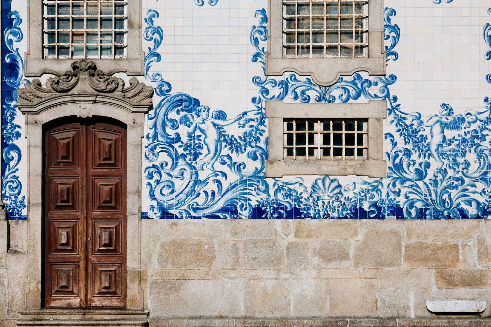 church-with-door-and-azulejos-wall-1136401967.jpg