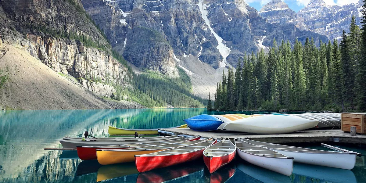 Boats moored to the shore at Lake Moraine