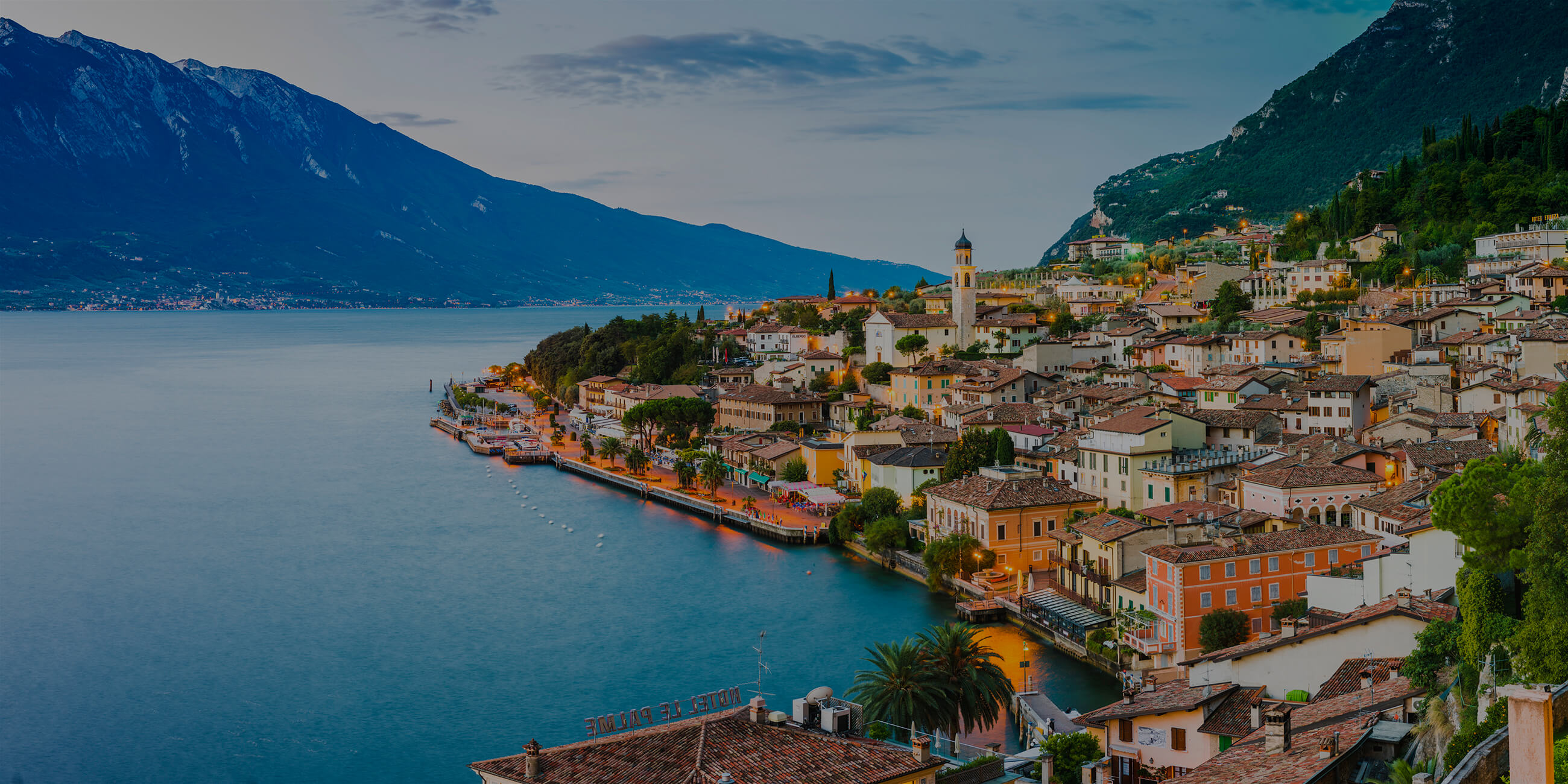 An aerial view of a village on a lake Garda in Italy