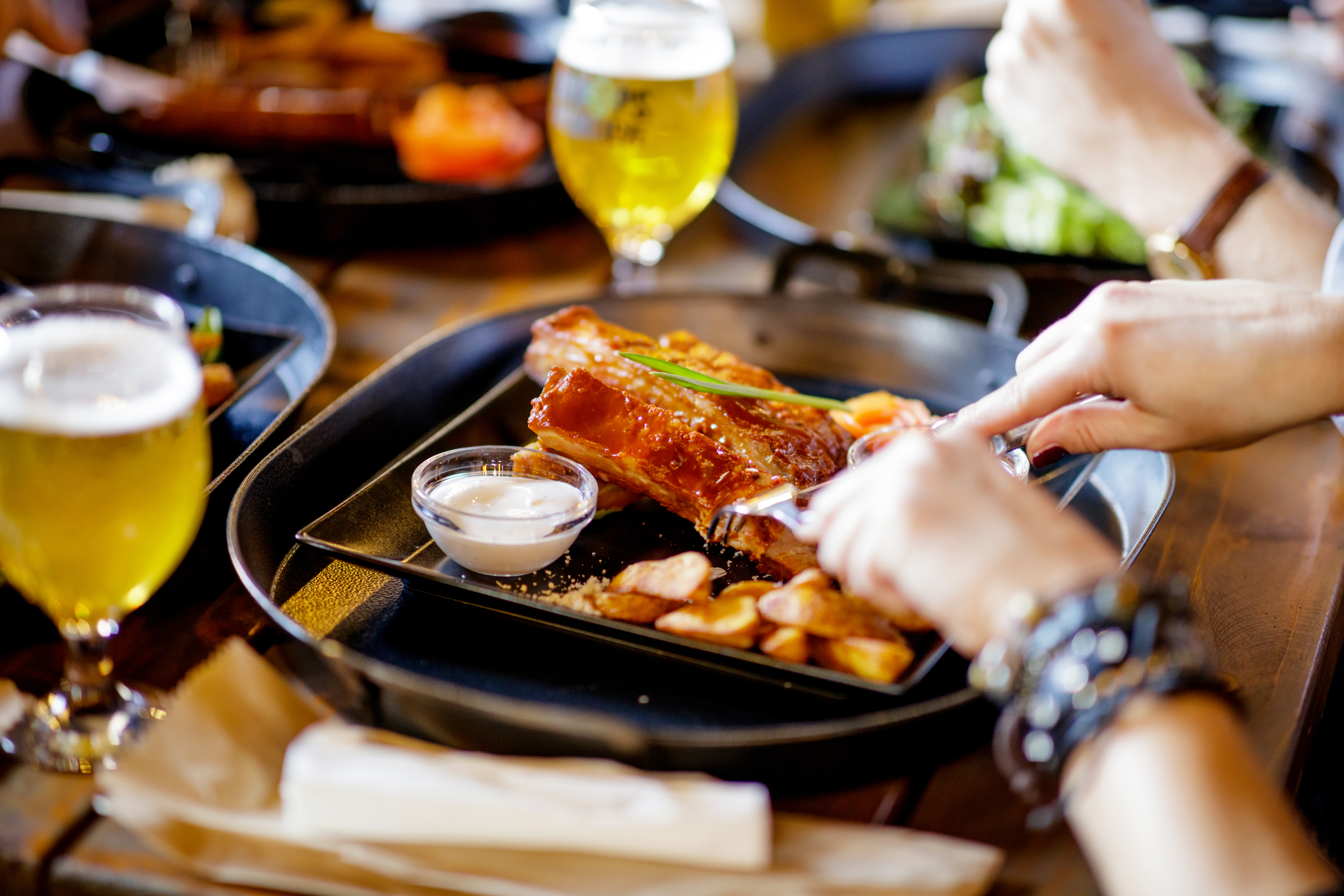 Having Barbecue Pork Sparerib In A Pub 1190146282