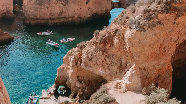 Boats floating among the rocks