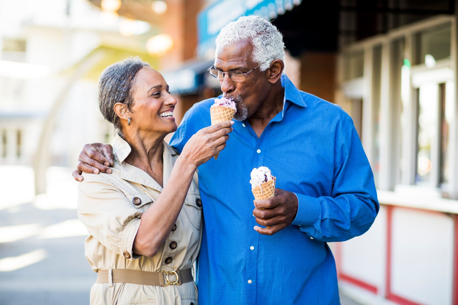 African American senior couple on the town with ice cream