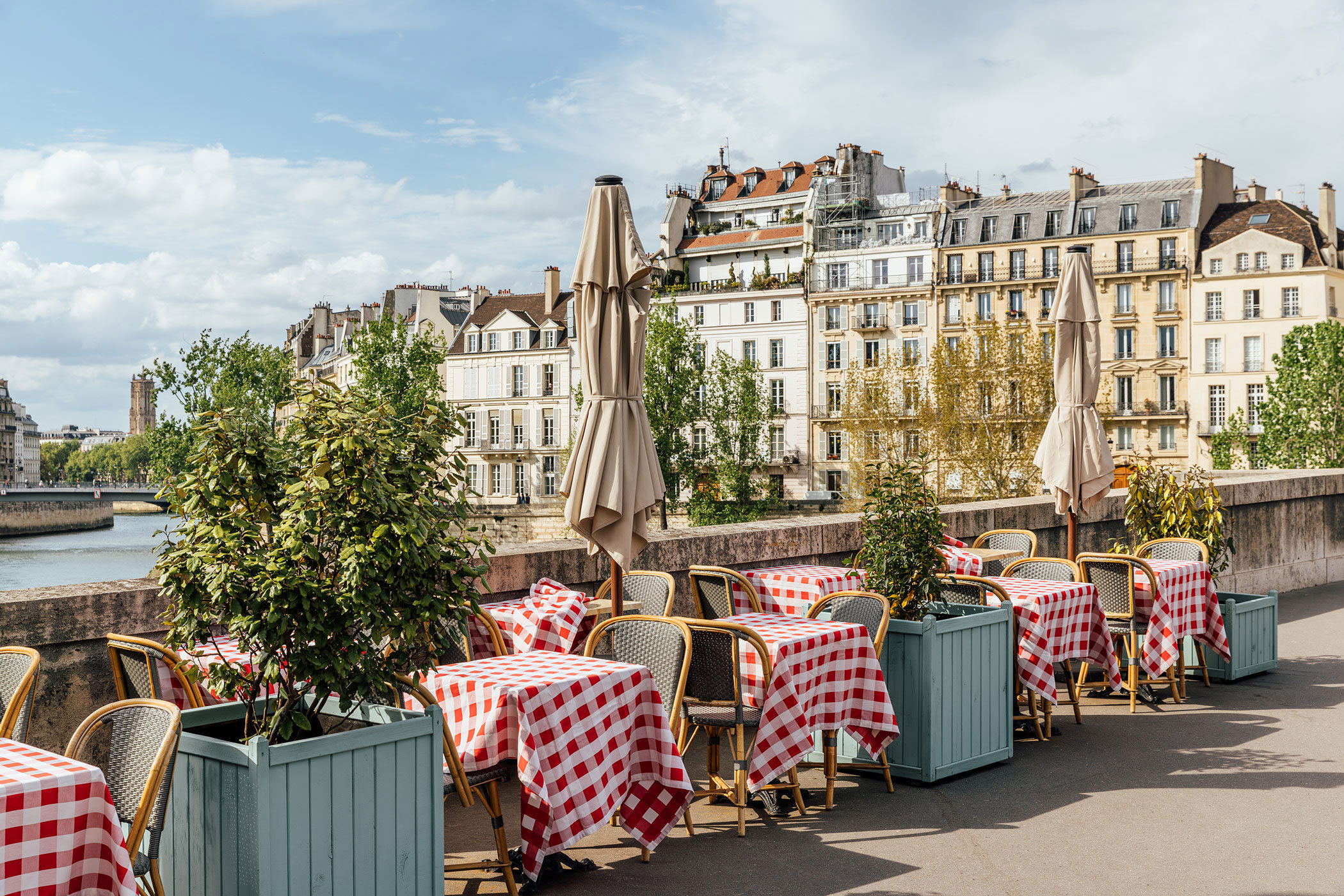 cafe-on-bank-seine-river-paris-france.jpg