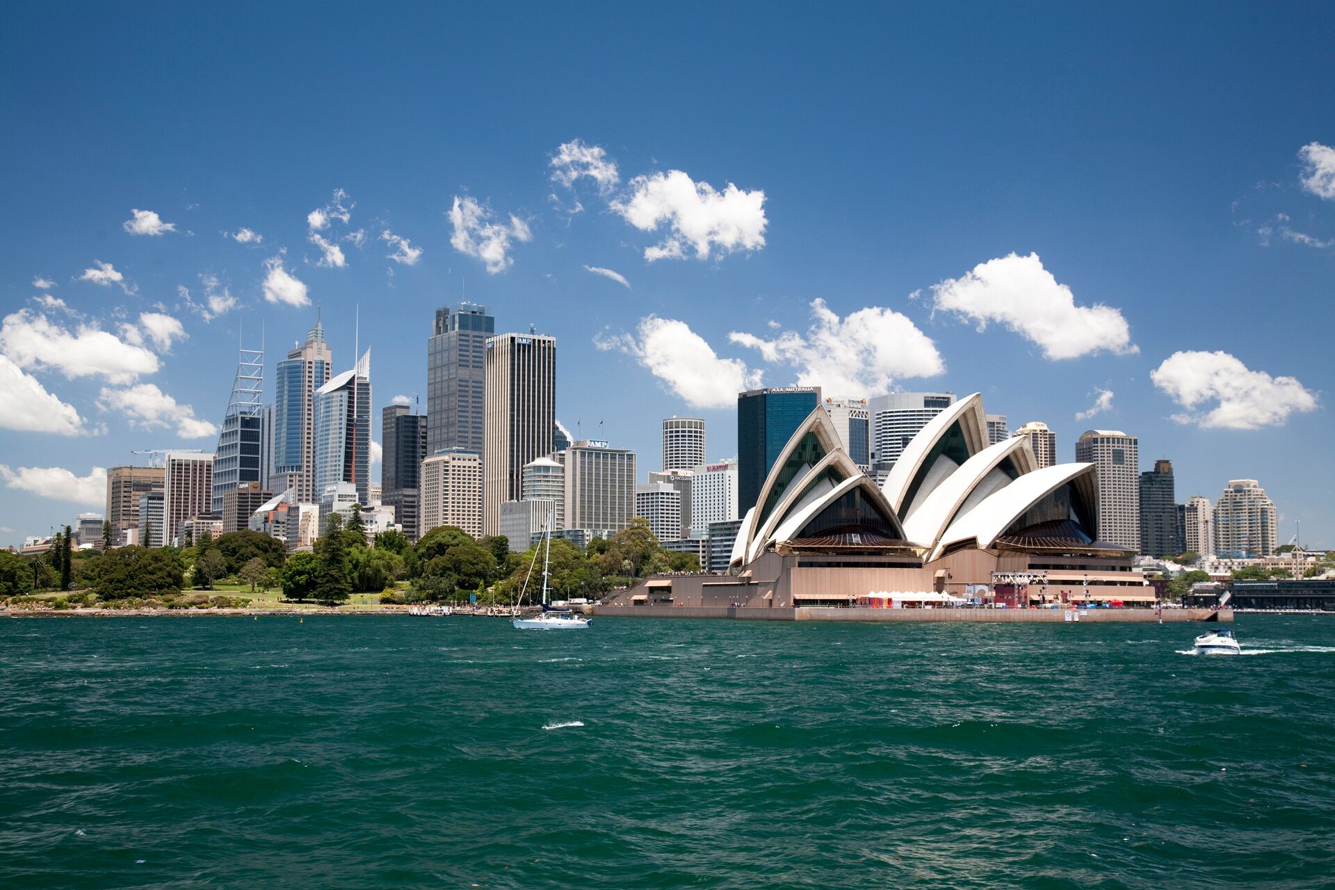 Large Sydney Opera House In Sydney Harbor With Downtown Skyline, Sydney, New South Wales, Australia 103455489