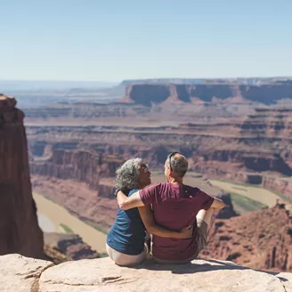 Senior couple hiking in Utah Desert in USA