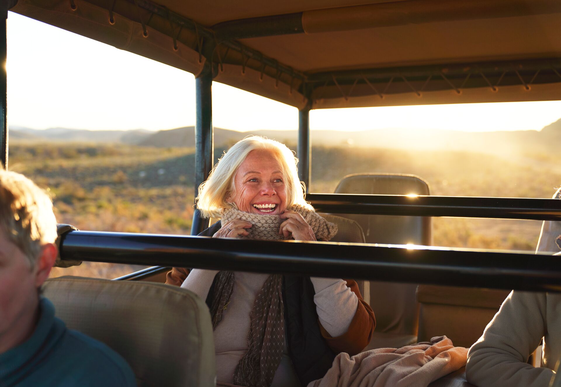 Older woman smiling while on an African safari