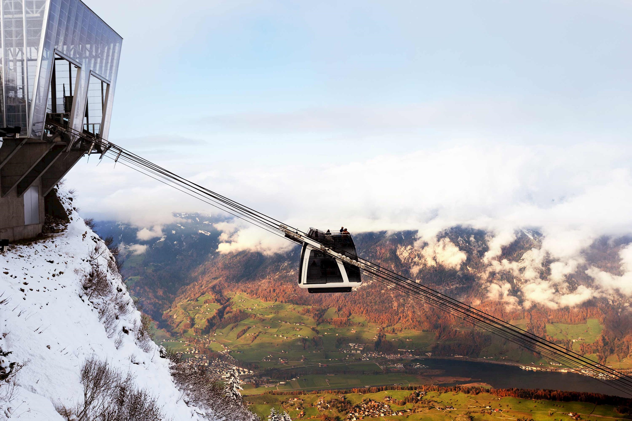 A cable car going up to Mount Stanserhorn