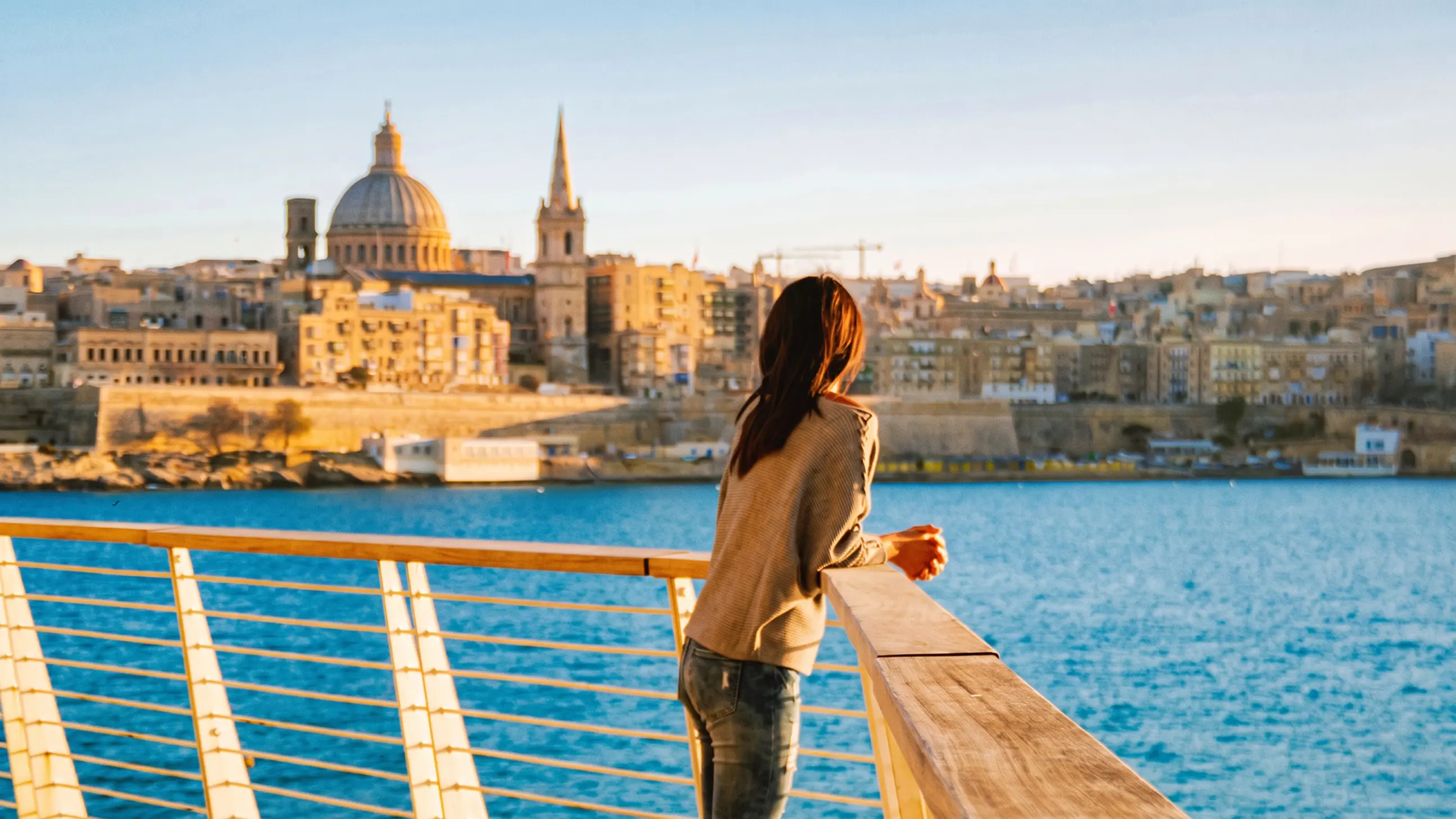 day-hero-sunset-view-over-valletta-malta-2211756774.webp