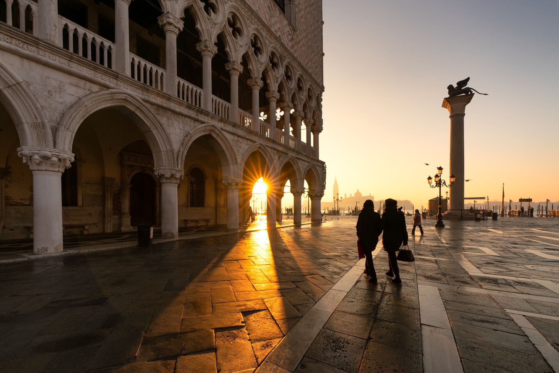 A beautiful morning at St Peter's Square in Venice, Italy with the Doge's Palace in the background 