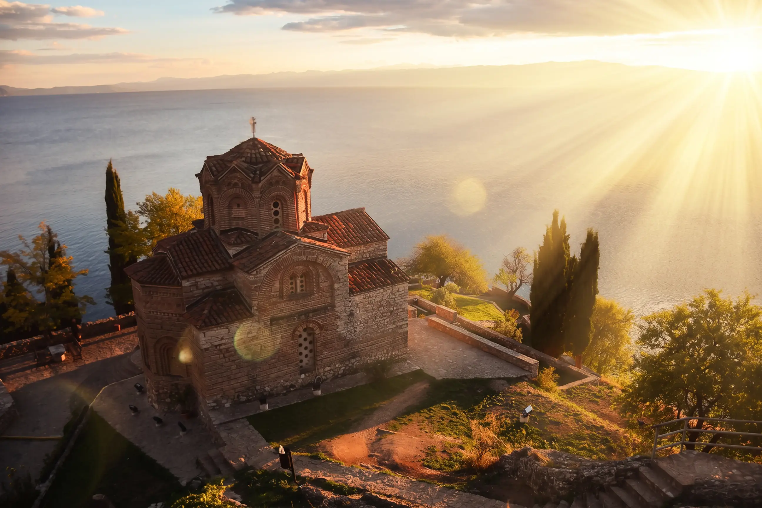 day-hero-church-with-lake-lake-orhid-north-macedonia-1269975722.webp