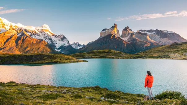 Tourist Admiring The Cordillera Paine In Torres Del Paine National Park, Chile