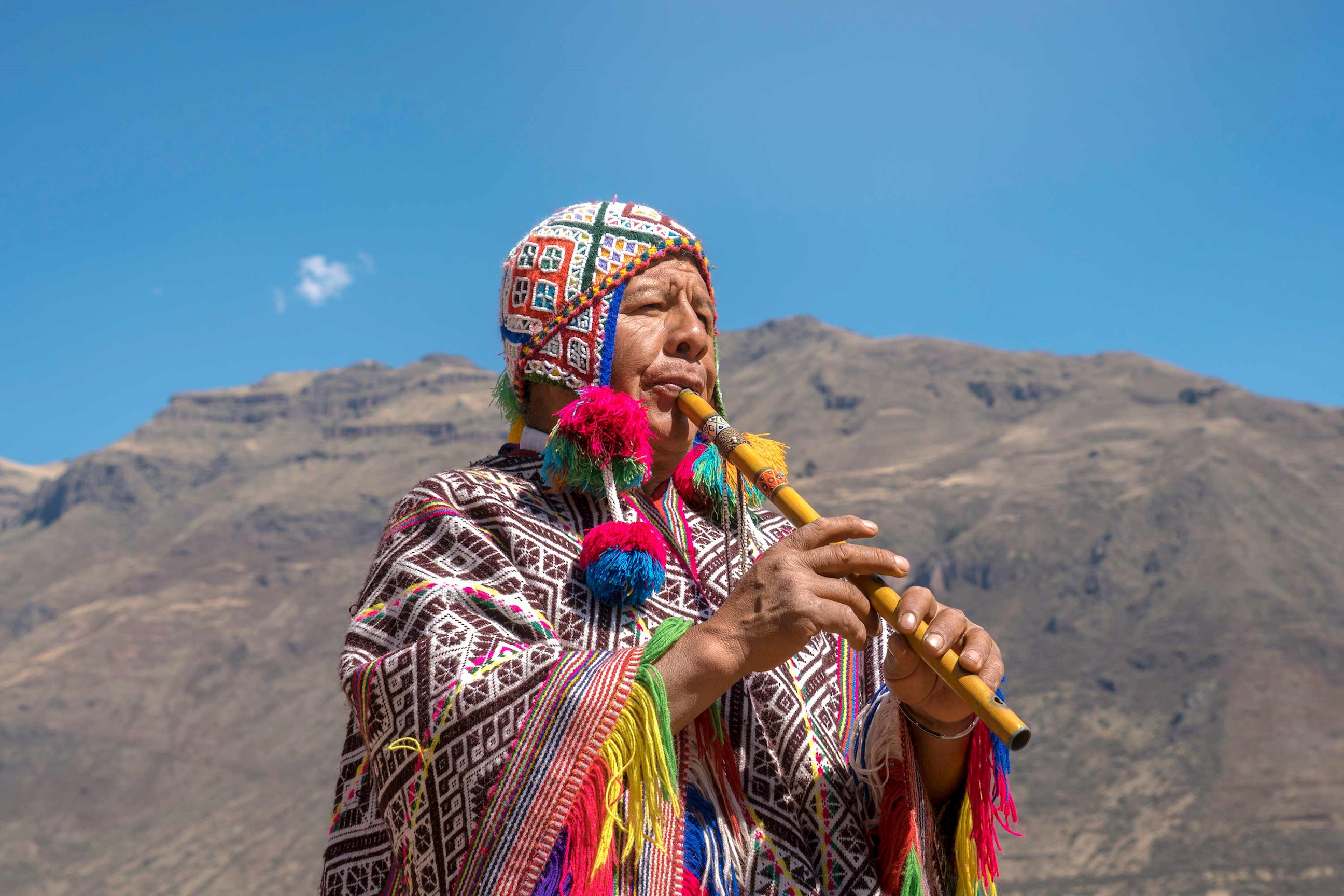 man-flute-lima-peru.jpg