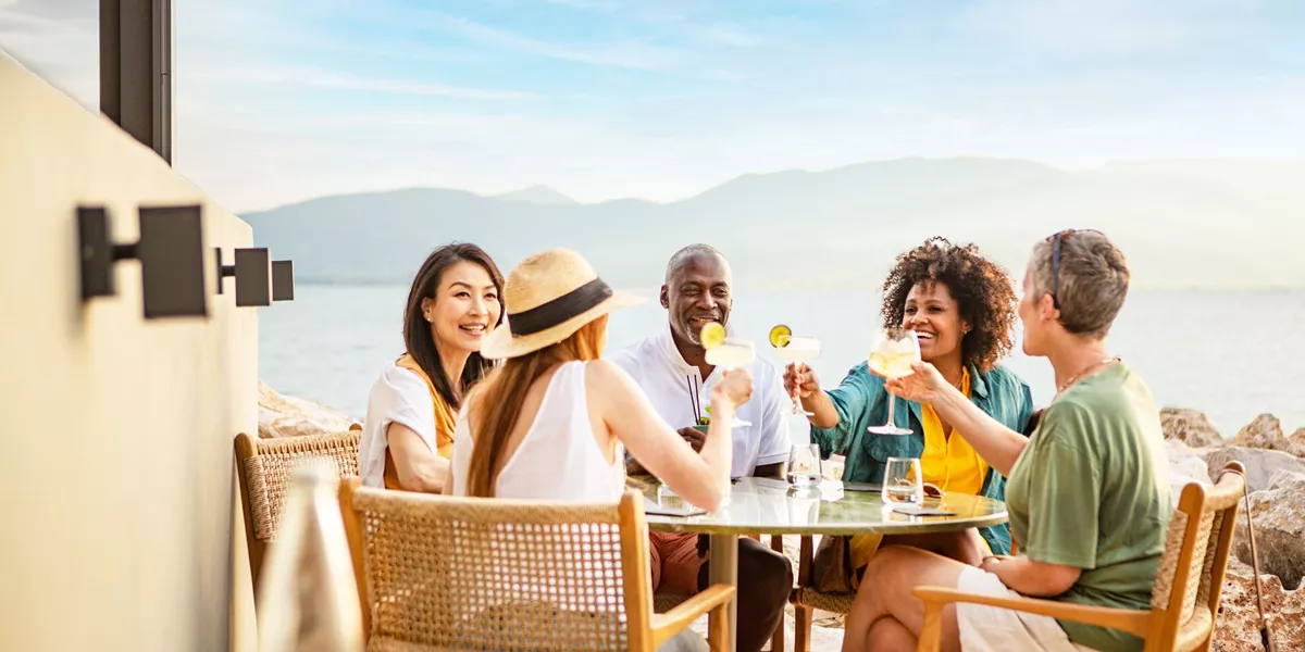 Guests Having Waterfront Cocktails In Nafplion