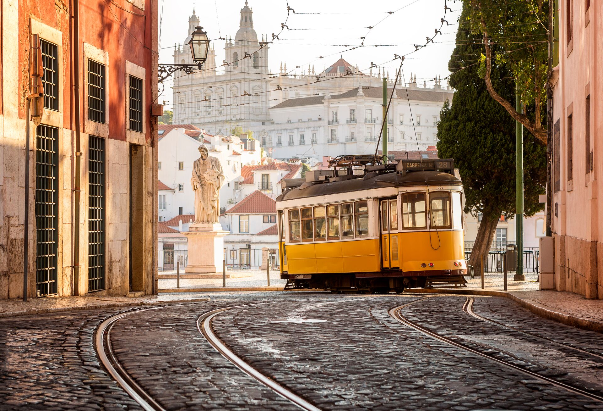 A yellow tram in Lisbon, Portugal
