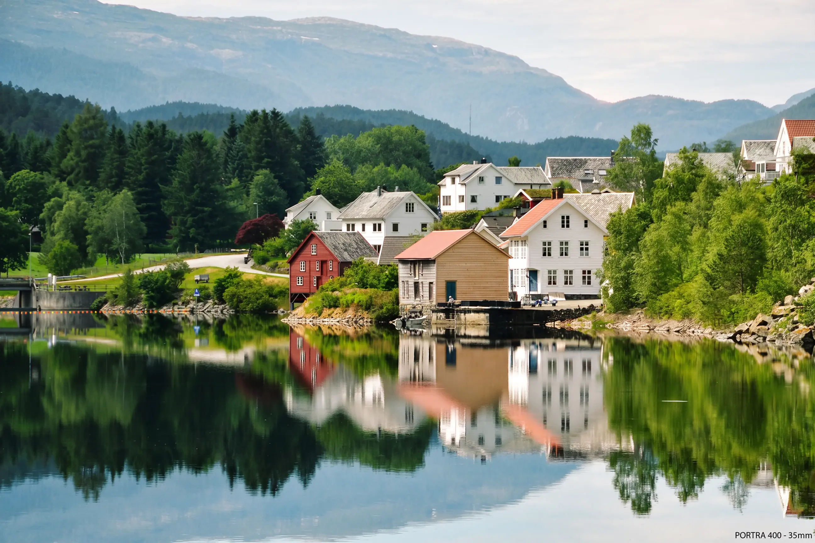 day-hero-country-lake-village-geirangerfjord-norway.webp